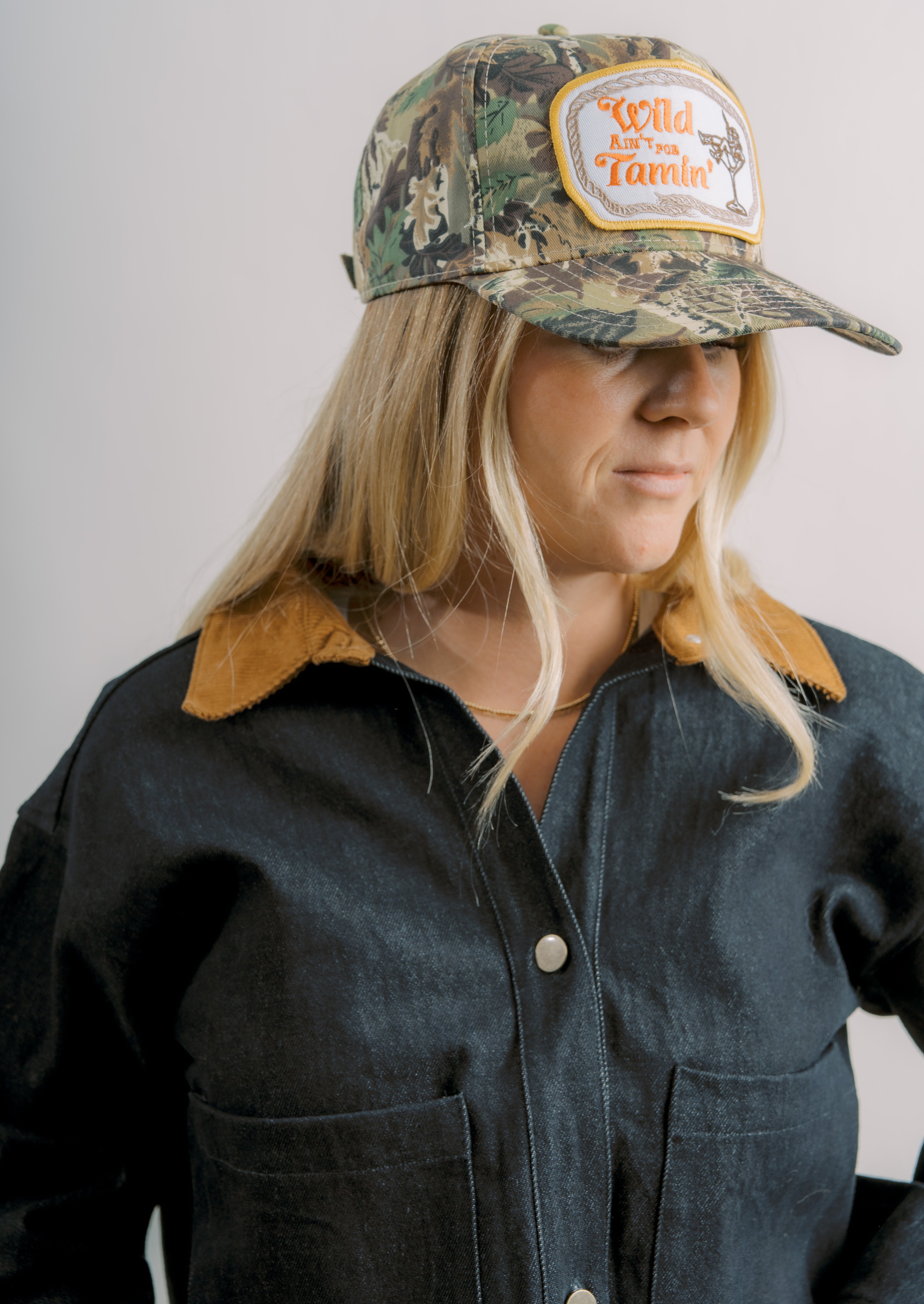 Wild Ain't For Tamin Camo Trucker Hat