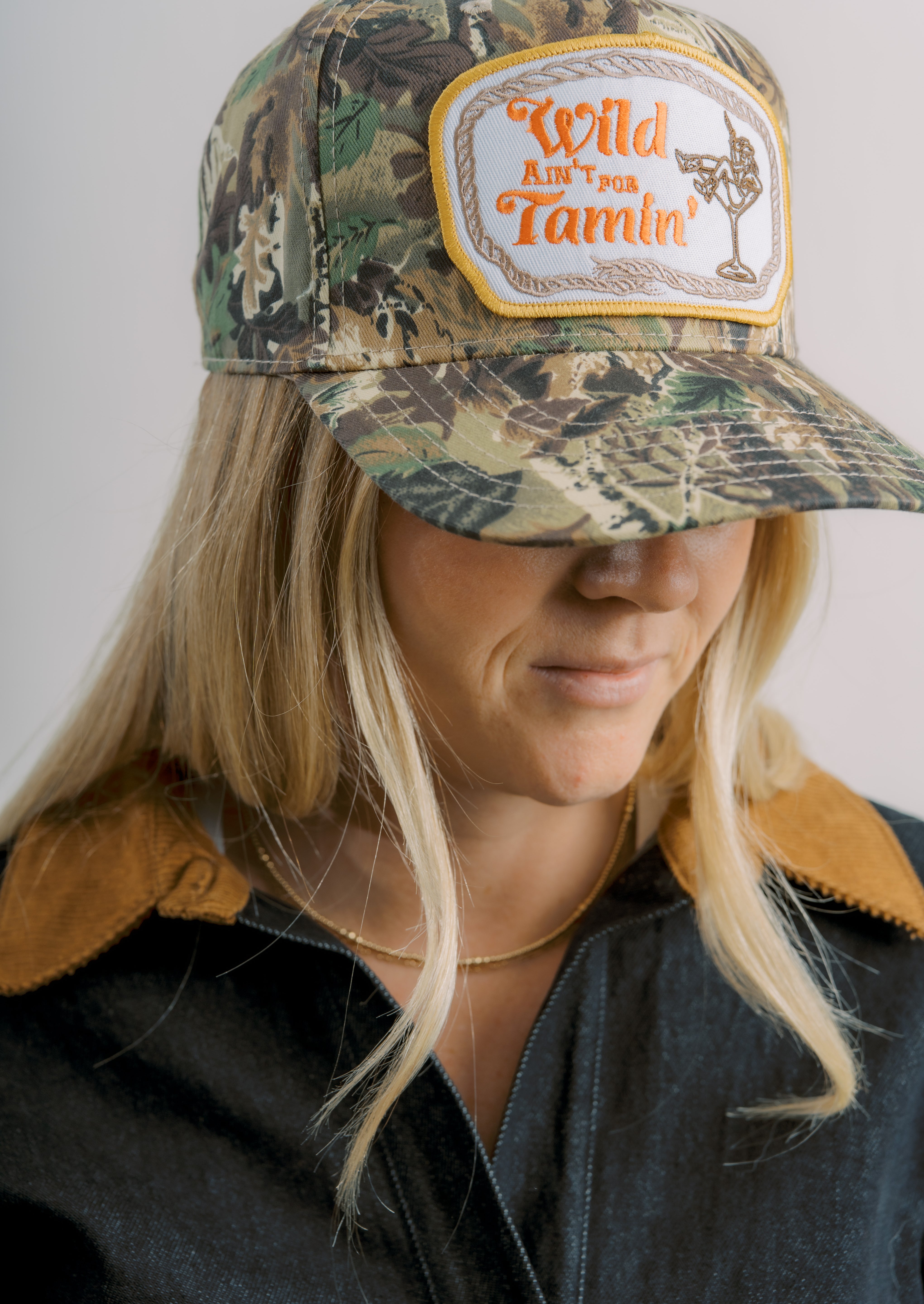 Wild Ain't For Tamin Camo Trucker Hat